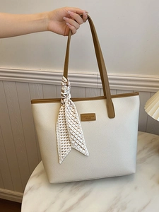 Large cream tote bag in lychee texture leather with brown straps and silk scarf