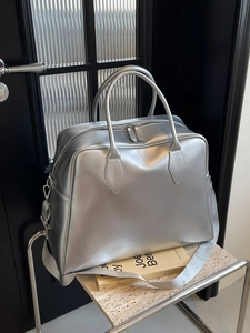 Large silver metallic mirror tote bag with top handles and adjustable shoulder strap