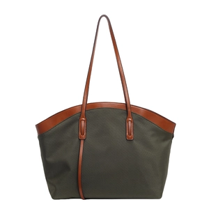 Large dark green Oxford cloth tote bag with brown leather handles for women's daily commute