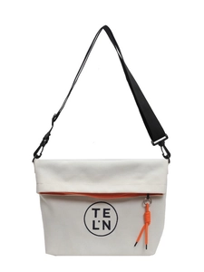 Minimalist beige canvas tote bag with black letter logo and adjustable shoulder strap