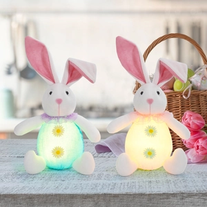 Easter glowing bunny gnomes with LED lights and daisy decor on a wooden table