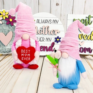 Close-up of Mother's Day gnomes with Best Mom Ever heart and tulip bouquet details