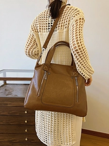Brown large-capacity tote bag with front zippers and adjustable strap for women
