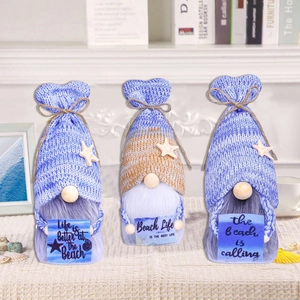 Three blue ocean themed beach gnomes with sea star accents and Life is Better slogans