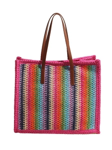 Handwoven colorful striped straw tote bag with brown leather straps on a white background