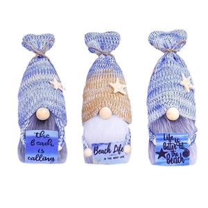 Three nautical ocean gnomes with starfish hats and knit tails on a clean white background