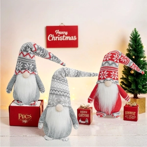Detailed trio of Christmas gnomes with knitted snowflake hats and white bushy beards