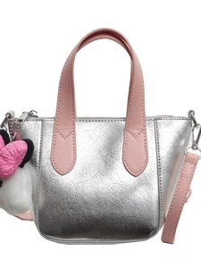 Silver metallic mini tote bag with pink leather handles and cute plush bow charm