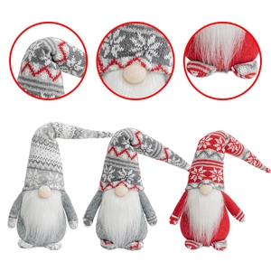 Detail showing the knitted snowflake hats and plush white beards of three Christmas gnomes