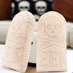 Set of beige Halloween tombstone pillows featuring skull embroidery and EEK text design