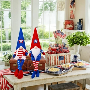 Close-up of patriotic gnome dolls with stars and stripes on a vintage suitcase