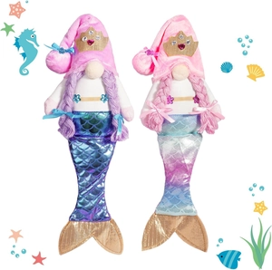 Detail of mermaid gnome plush with shiny scales, golden crowns and braided hair