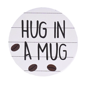 Rustic round wooden coffee sign featuring 'HUG IN A MUG' text and coffee bean motifs