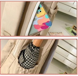 Detail of beige canvas backpack showing side elastic pocket with folding umbrella storage
