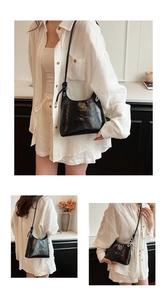 Detail showing glossy black patent leather bag with pearls and knotted strap detail