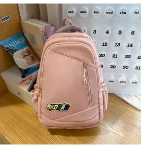 Pink multi-pocket waterproof nylon backpack with RKOBAG patch and large capacity