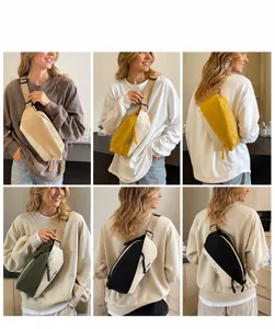 Detailaufnahmen der Canvas-Brusttasche mit verstellbarem Riemen und Kontrastfarben