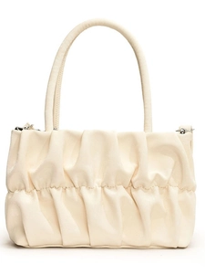 Chic off-white pleated shoulder bag with soft textured handle and crossbody strap