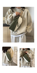 Detailansicht der stylischen Canvas-Brusttasche mit Kontrastfarben und verstellbarem Gurt