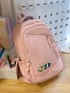 Pink waterproof nylon backpack with RKDBAG embroidery and multi-pocket design for school