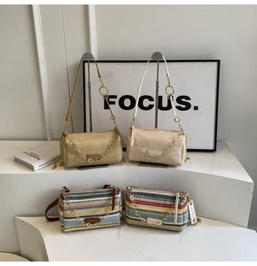 Detail of colorful rainbow woven bags and solid straw cylinder handbags with chain straps