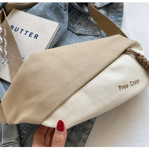 Nahaufnahme der Canvas-Brusttasche mit Free Color Stickerei und gewebtem Reißverschluss