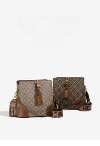 Detail view of khaki and brown bucket bags with vintage logo print and wide jacquard strap