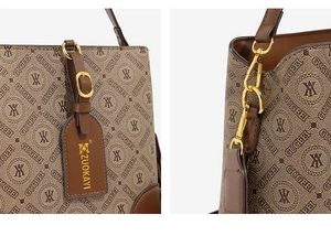 Detail of vintage monogram leather bag showing gold hardware and embossed brand tag