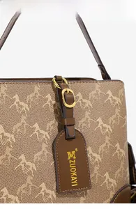 Detail of a brown horse print bucket bag with leather handle and branded logo tag