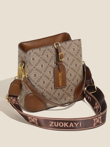 Brown bucket bag for women with monogram pattern and wide detachable shoulder strap