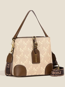 Beige bucket bag with horse pattern, brown leather trim and wide Zuokayi canvas strap
