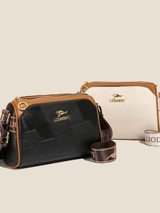 Schicke Boston Pillow Bags in Schwarz und Beige mit geometrischer Steppung und breitem Gurt