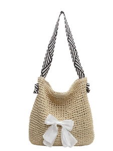 Large straw tote bag with white organza bow and black-white striped shoulder strap