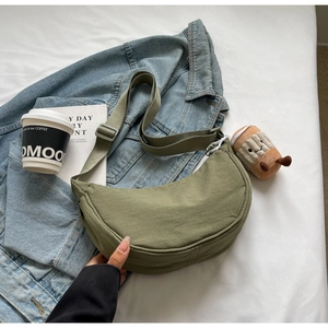 Minimalist morandi green canvas crescent crossbody bag with adjustable wide fabric strap