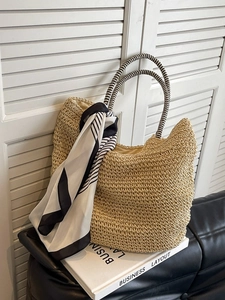 Large capacity straw tote bag with striped handles and decorative silk scarf for summer
