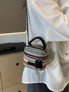 Mini rainbow straw crossbody bag with colorful weave pattern and chain strap