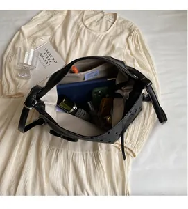 Interior view of large capacity tote bag showing smartphone and daily essentials