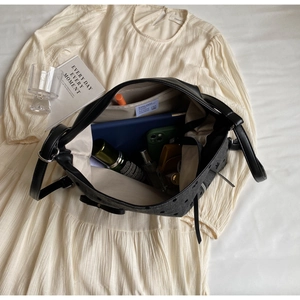 Detailed top view of a large capacity tote bag with organized compartments and inner zip pocket