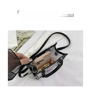 Internal view of transparent jelly bag showing storage for phone and lipstick