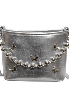 Silver metallic shoulder bag with butterfly accents and decorative beaded handle