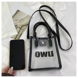 Detail view of small black transparent jelly bag with OWU logo and phone for size comparison