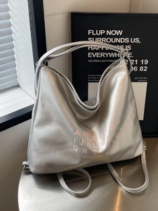 Silver metallic hobo shoulder bag with pink letter print for trendy commuter women