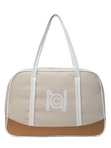 Retro contrast tote bag with cream fabric and brown leather accents for summer commuting