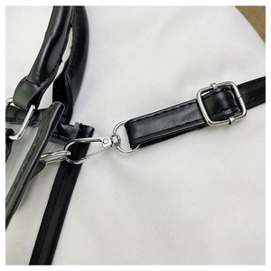 Detail of silver metal lobster clasp and adjustable black leather strap on clear tote bag