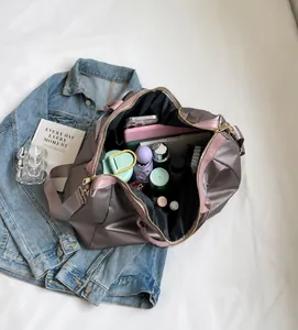 Detail view of large travel bag interior showing spacious storage for essentials