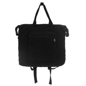 Minimalist black canvas backpack with front zipper pocket and side buckles for women