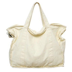Minimalist off-white canvas tote bag with raw edges and spacious interior for women