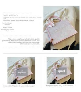 Détail du cabas rose brodé avec anse en foulard, montrant sa grande capacité format A4