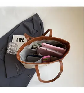 Top view of large tote bag interior showing spacious compartments and storage capacity