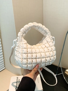 Chic beige quilted nylon dumpling bag featuring textured bubble fabric for women